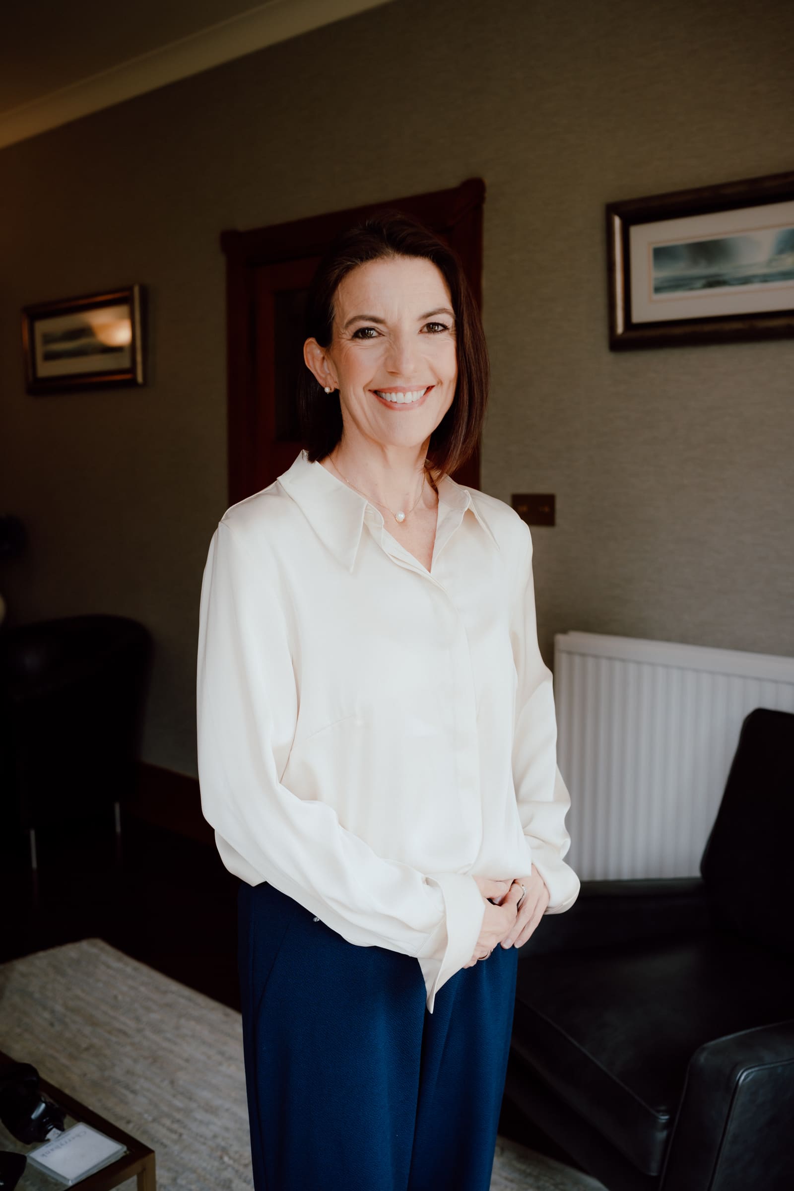 Dr Elaine Halley standing in the patient lounge at Cherrybank Dental Spa